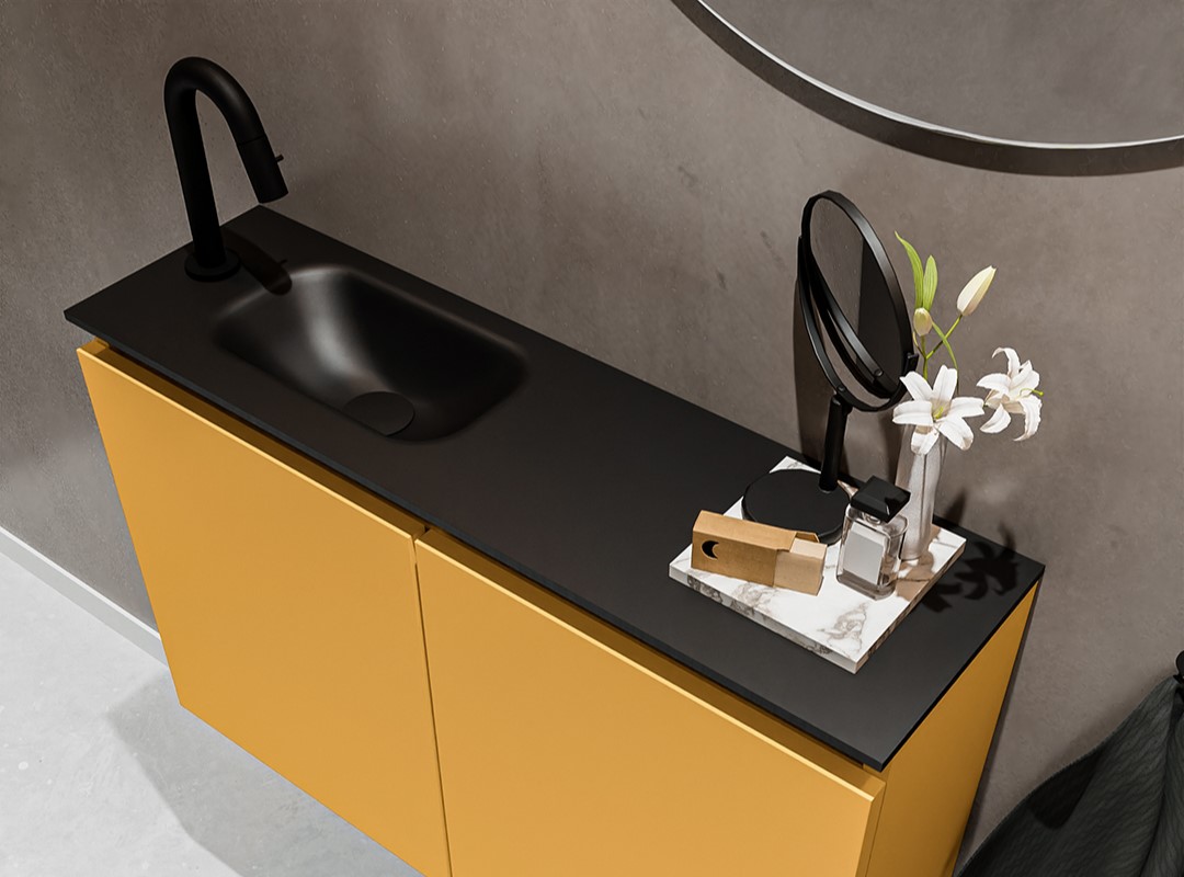 wastafel zwart met gele onderkast toitlet meubel